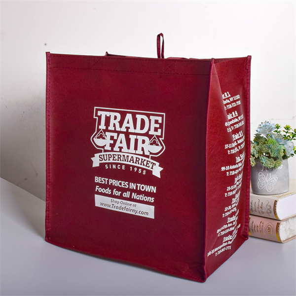 Ditch the disposable bags and choose something that lasts with reusable gift bags with handles.