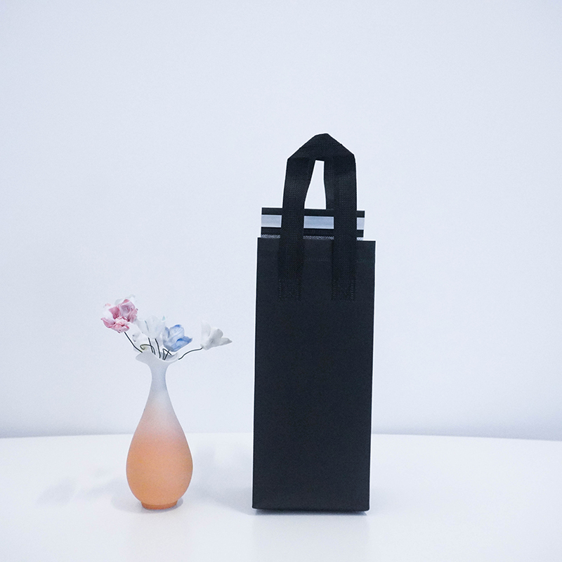 Small black takeout milk tea bag