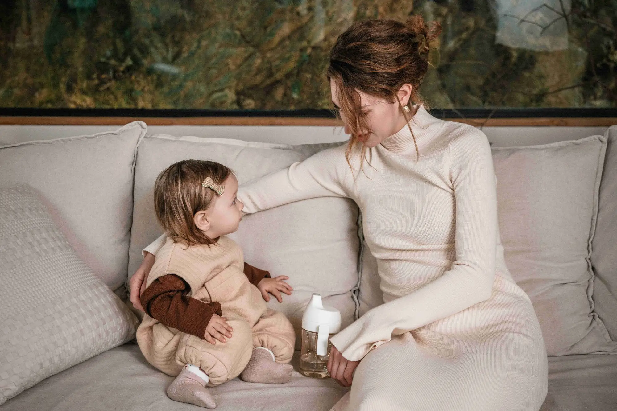A parent caring for their baby