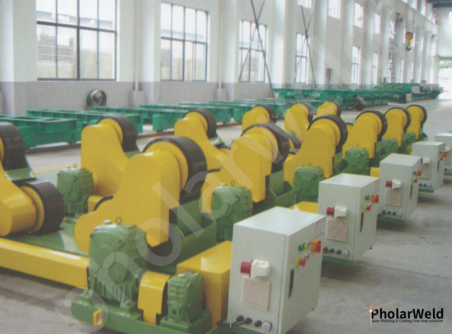 How do welding rollers drive the workpiece rotation?