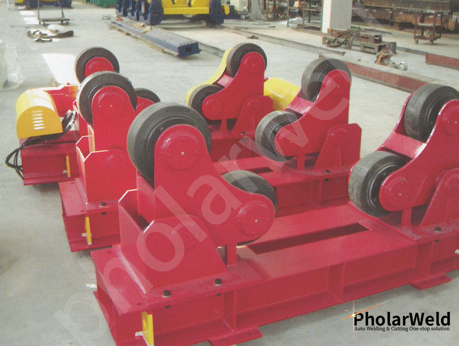 How do welding rollers drive the workpiece rotation?