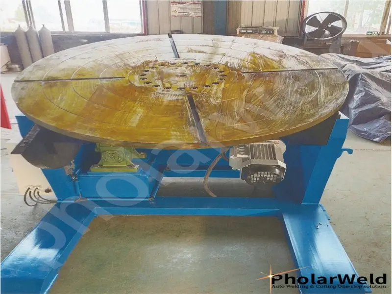 How to select a suitable positioner for a robotic welding station?