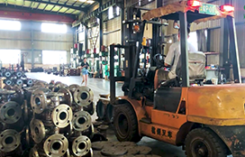 In the production workshop, the workers transported the spare parts of the pump
