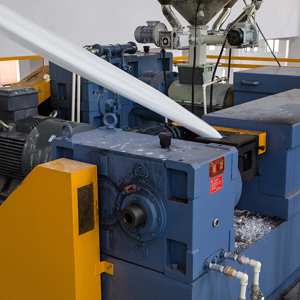 Versatile non woven roll making machine