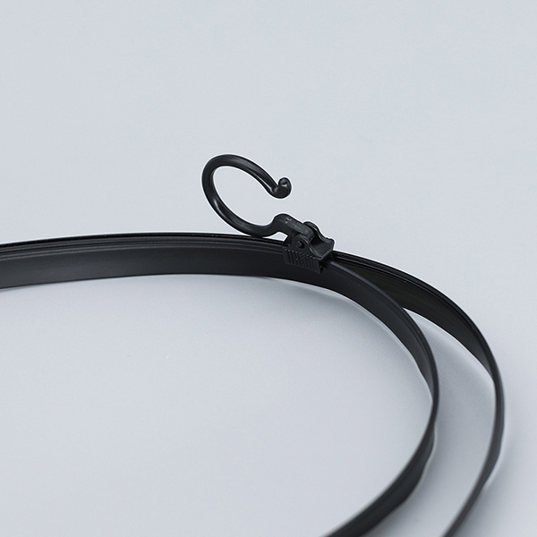 Make a statement with a bold black plastic zipper